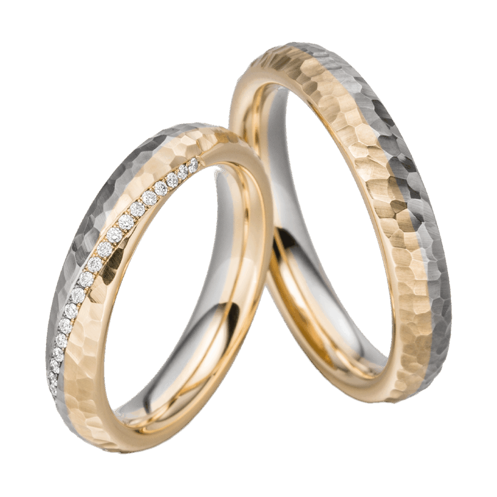 Hochwertige Bicolor-Trauringe aus Platin und Gelbgold mit diagonalen Brillanten