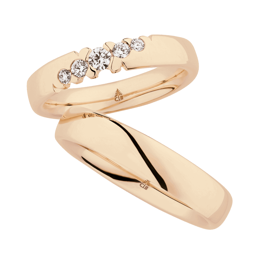 Edle Roségold-Trauringe mit fünf Diamanten im Brillantschliff in feiner Einfassung