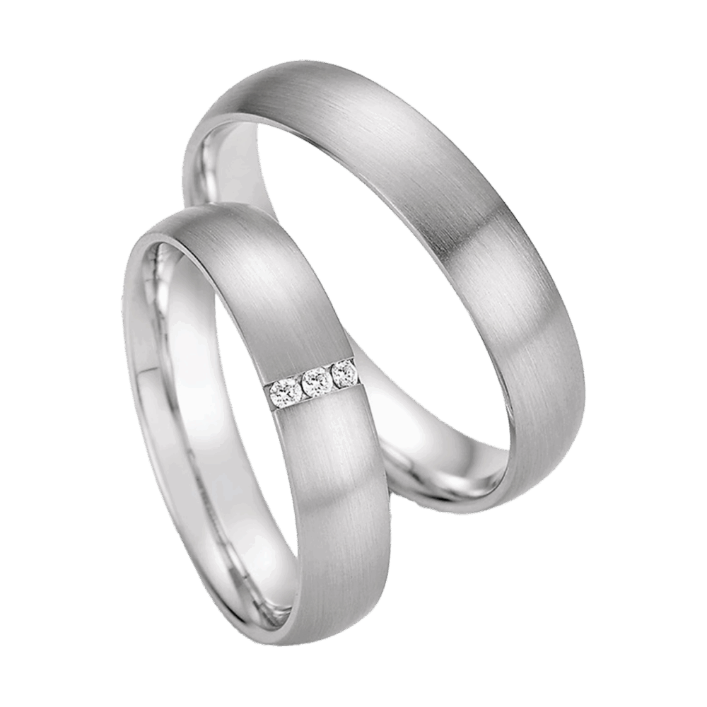 Platin-Trauringe mit dezenter strichmatter Oberfläche und brillanten Diamanten in Quereinlage