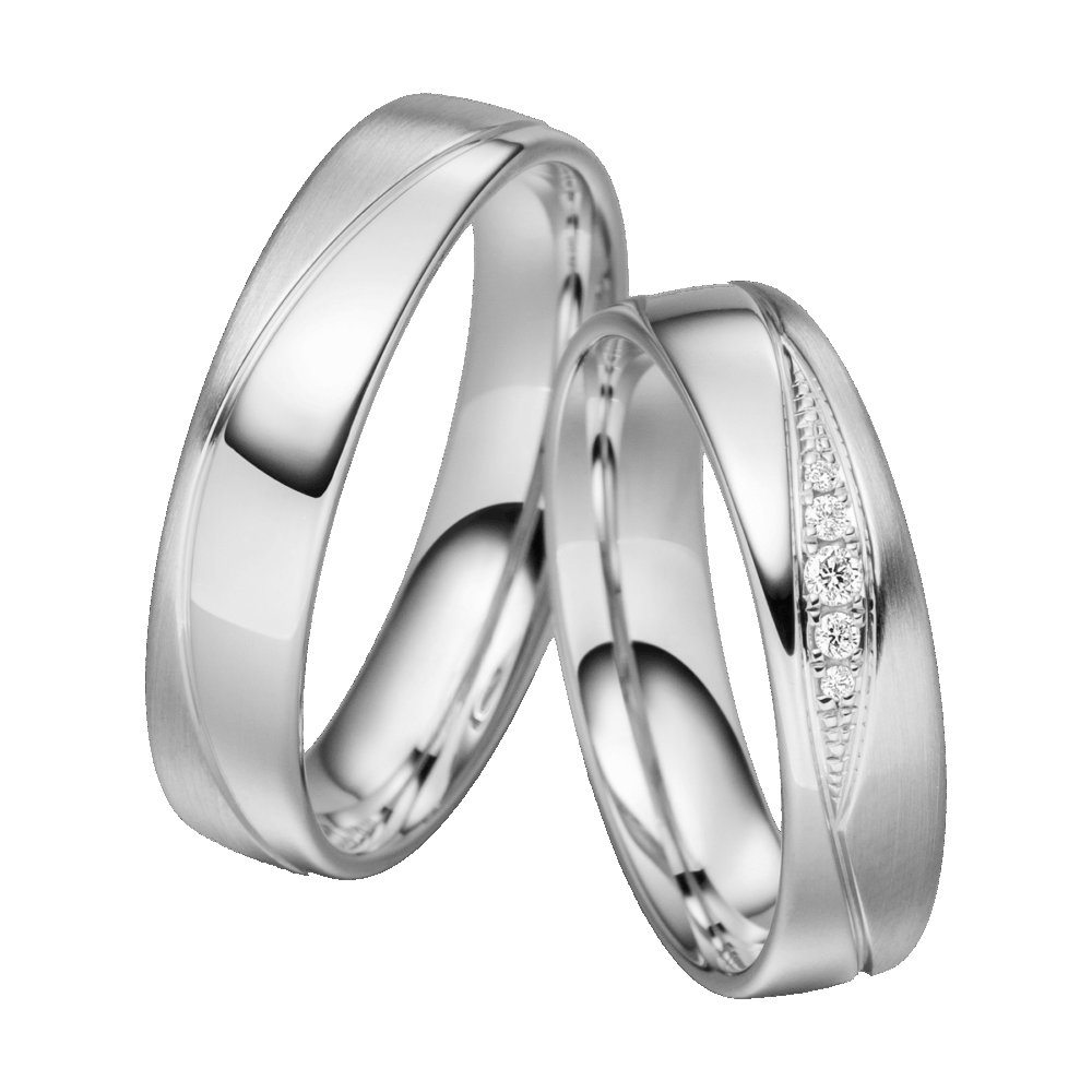 Platin-Trauringe mit Wellenfuge und eingefassten Diamanten – zeitlose Symbole der Liebe