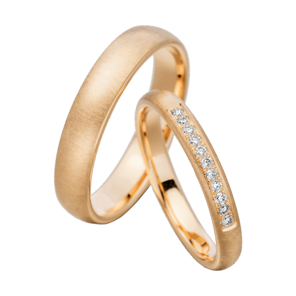 Gelbgoldener Trauring mit fliesmatter Textur und mittig eingearbeiteten Brillanten im Brillantschliff