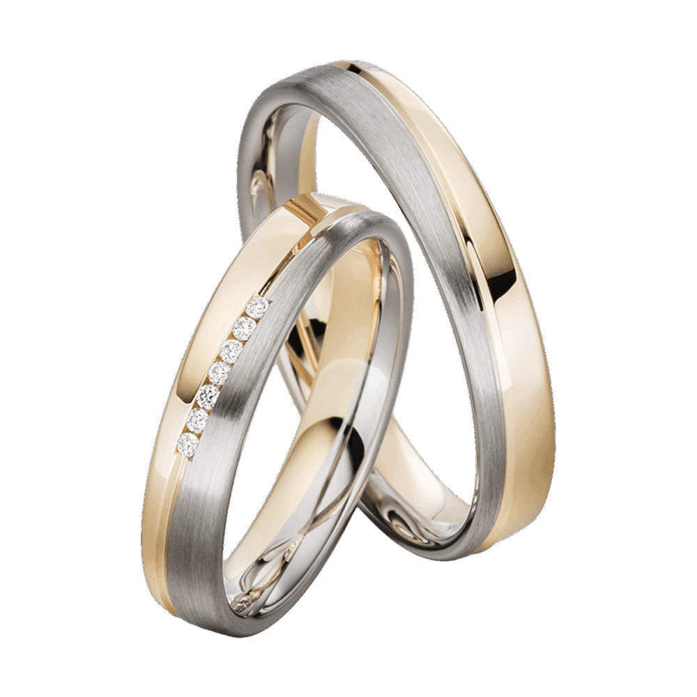Bicolor-Trauringe aus Platin und Gelbgold mit polierter Fuge und funkelndem Brillanten im Damenring