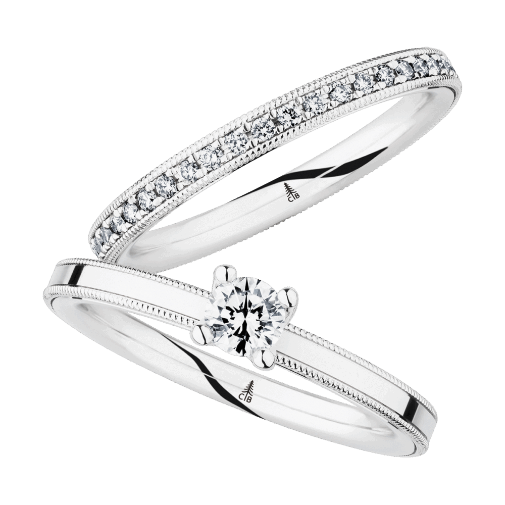 Platinring „Mountain Peak“ mit schwebendem Diamant, kunstvoller Millegriffes-Verzierung und klarer Linienführung – ein Symbol für Stärke und ewige Liebe