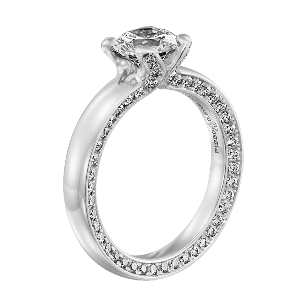 Draufsicht des „Shimmer“ Rings aus Platin mit Brillant-Solitär und funkelndem Diamantbesatz entlang der Ringschiene – strahlend wie Sternenlicht