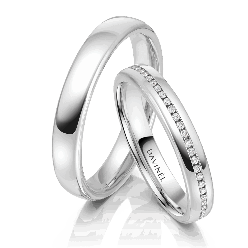 Trauringe Symétrie Sacrée aus Platin mit umlaufender Kanalfassung und 56 Brillanten im Damenring
