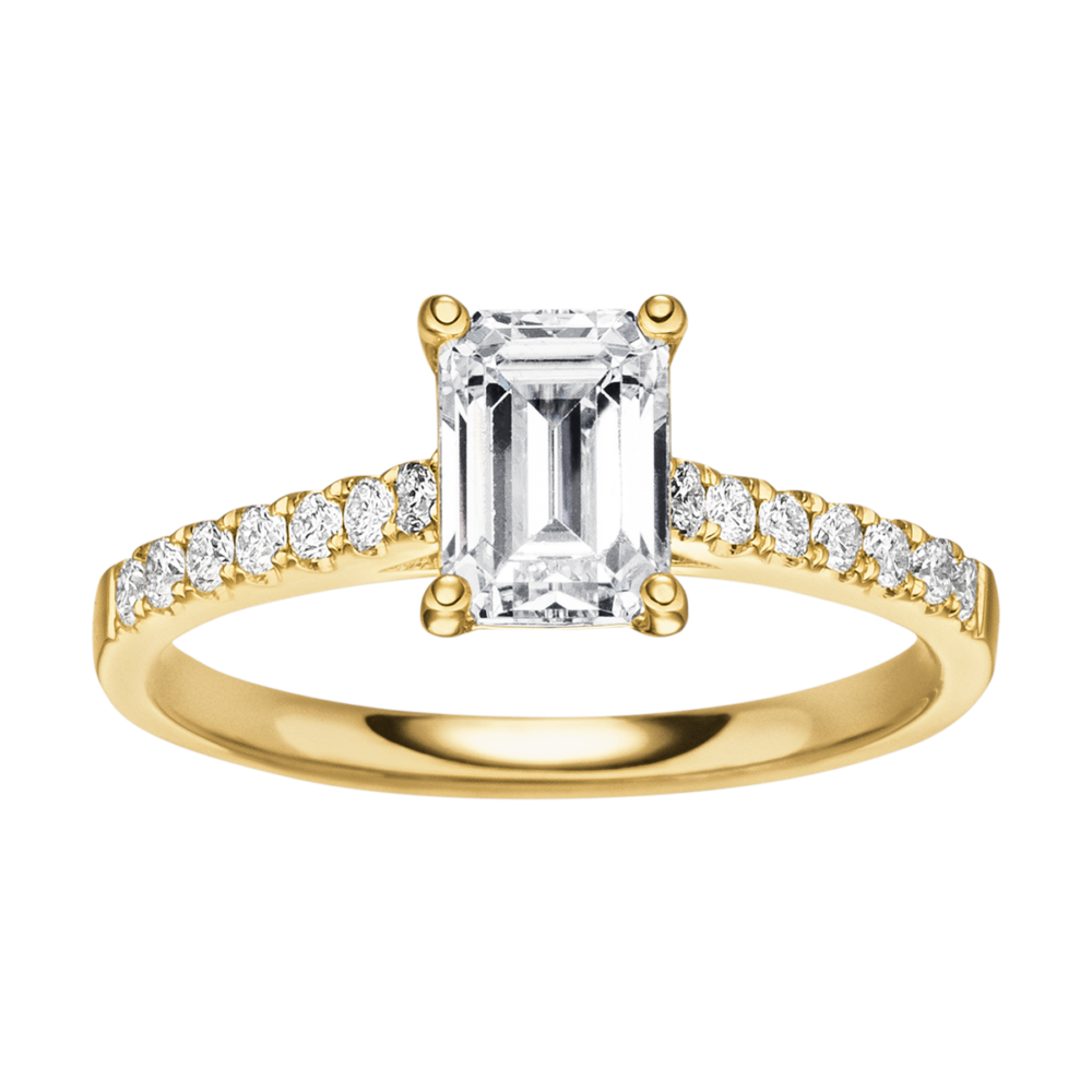Gelbgoldring „Timeless“ mit zentralem Emeraldschliff-Diamanten und halbgefasster Brillanz entlang der Ringschiene – klassische Eleganz von oben