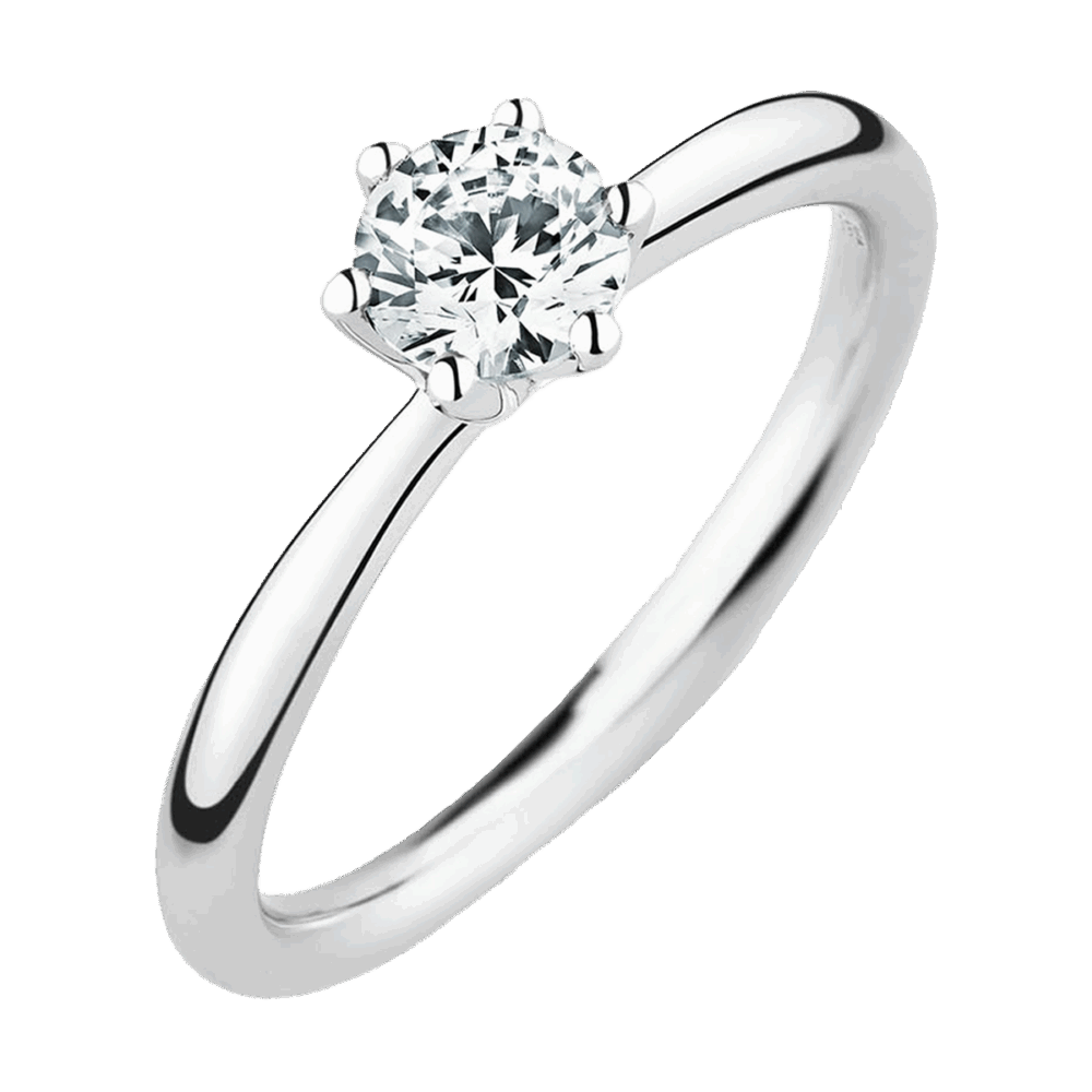 Weißgoldring „Whisper of Stars“ mit zentralem 0,25 ct Brillant in harmonischer Sechskrappenfassung – inspiriert vom Flüstern der Sterne